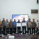 Bupati dan Ketua KPU Asahan Tandatangani NPHD
